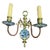 Beautiful pair of hand painted delft wall sconces. They feature a central brass stem with a hanging loop at the top. A...