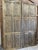 Elevate your interiors with this vintage brass cladded carved barn door, a striking fusion of artisan craftsmanship and...
