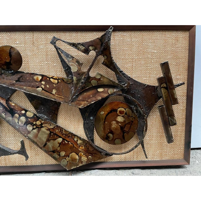 Brutalist wall sculpture designed and manufactured by the Danish artist Henrik Horst, circa 1970s. Patinated metal...