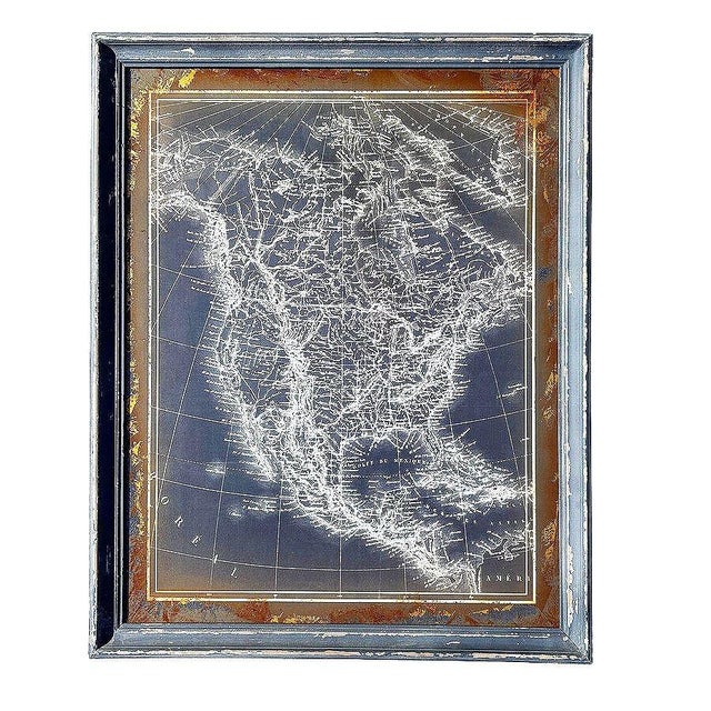 Vintage-style monochrome map of North America, featuring intricate white cartographic details of North America on a dark...