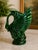 Beautiful vintage Royal Haeger swan vase featuring a rich emerald green glaze accented with deep blue undertones that...
