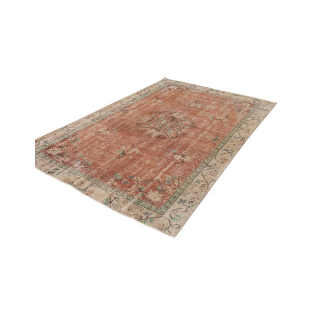 Handknotted vintage wool rug from Oushak region of Turkey. Approximately 50-60 years old. In very good condition.