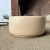 Vintage Large John Follis "Tire" beige Glaze Planter for Architectural Pottery. There is no maker mark on the planter.