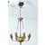 A 19th-century French chandelier with carved acanthus leaf and eagle head motifs, painted to look like brass. The wood...