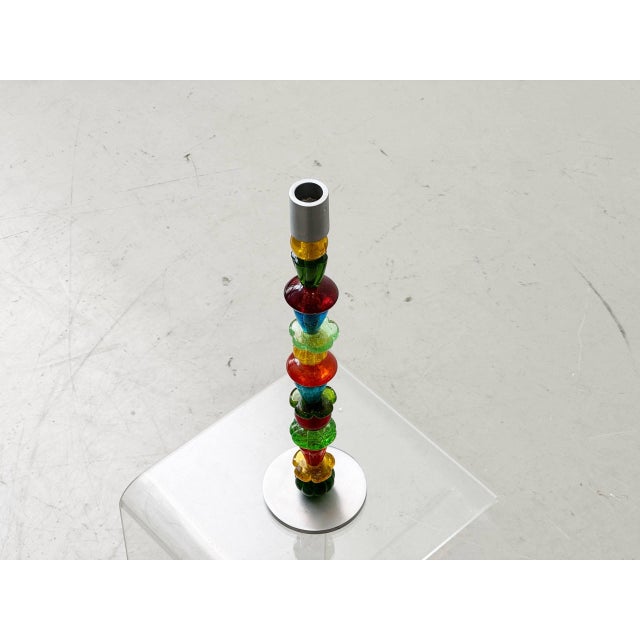 A striking candlestick from räder design with a clean, modern design and vibrant color effect. The combination of colored...