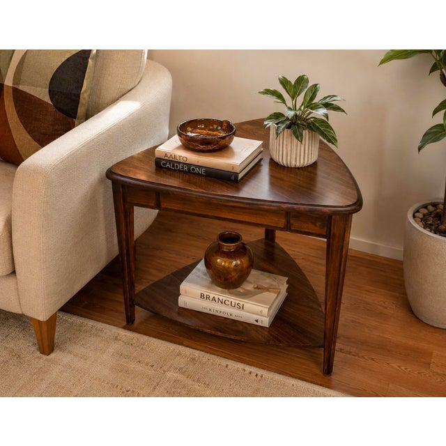 A distinctive vintage Mid-Century Modern two-tier end table by Mersman, model 63-5, featuring the desirable rounded...