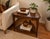 A distinctive vintage Mid-Century Modern two-tier end table by Mersman, model 63-5, featuring the desirable rounded...