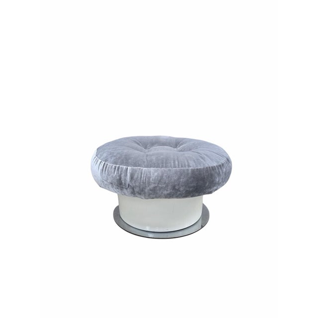 Mid Century Modern Tufted Velvet Round Ottoman with Pedestal Base This piece is a stylish, low-profile upholstered ottoman...