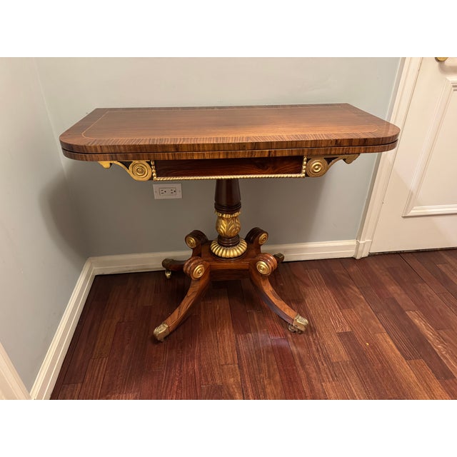 Rosewood Table with gilt accent. Can be used as Console table and converts to Card/ Game/ Dining table (36" square). Very...