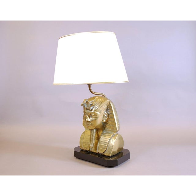 Vintage Regency Style Pharaoh Tutankhamun Lamp in Brass, in Good conditions. Designed 1970 to 1979 European Plug (up to...