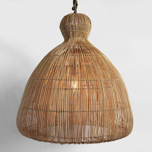 Hand crafted raw rattan mushroom lantern. Each handmade with natural finish so there will be slight variations for each in...