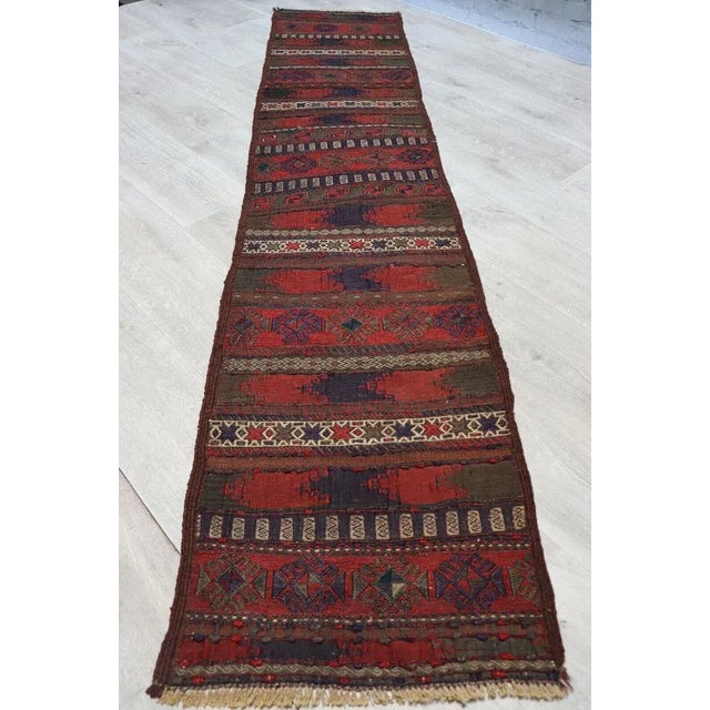 Antique Afghan nomadic Beloch sumakh kilim. Size: 7,8 x1,6 ft (240x50 cm). North Afghanistan kilim of outstanding colour...