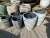 Lightweight cement mix planter with rough scratched texture. Includes black planter insert. Each slightly unique. Each...