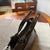 21st Century Perfect Condition Patent Black Leather Hand-Bag by Cartier For Sale - Image 9 of 18