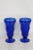 This beautiful pair of glasses is made of cobalt glass. These glasses are stamped as having been made by Anchor Hocking,...