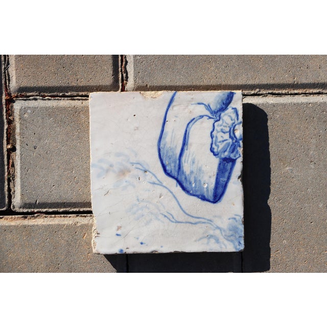 Circa: 18th Century. Country: Portugal. Material: Earthenware, Tin-glazed pottery. Note: This tile was once part of a...