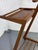 A beautiful Modernist dressboy. with a beautiful wooden MCM Zig Zag design with brass bolts and wheels. Made in the 1950s...