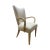 This is the Root Beer chair by Brueton. It is done in a cream white fabric with solid maple legs and arms. The hardwood...