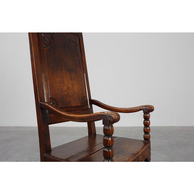 Belgium / 18th Century / Liege Armchair / oak / Antique A chair that speaks in whispers of history, carved from solid oak...