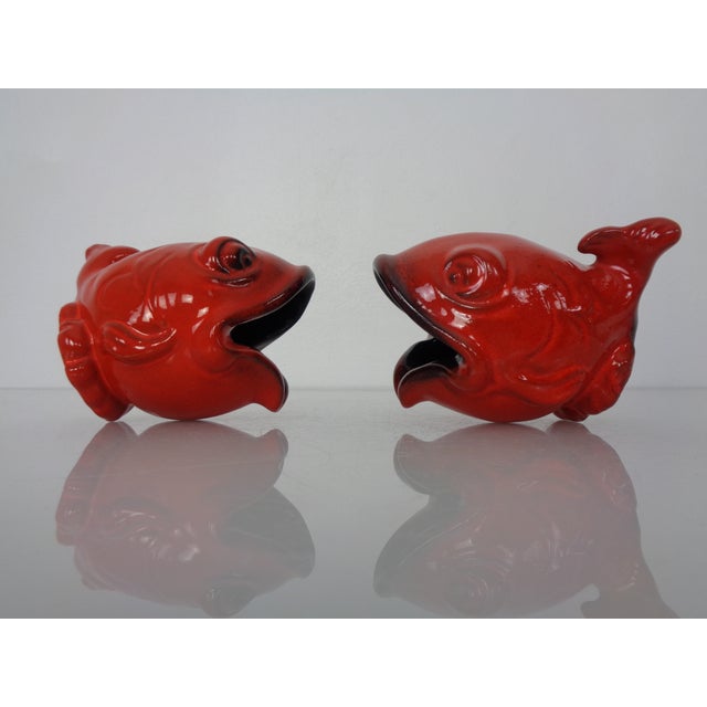 Pair of ceramic ashtrays in the shape of a fish from the 1970s in very good condition without damage.