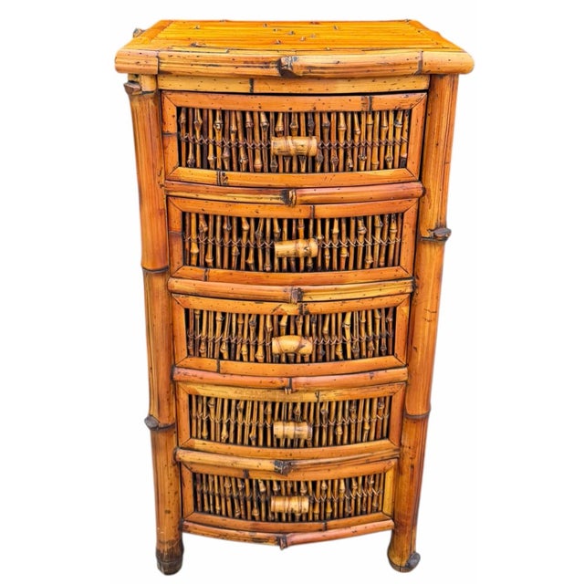 A vintage five-drawer chest crafted from real split bamboo, featuring intricately constructed bamboo-lattice drawer fronts...