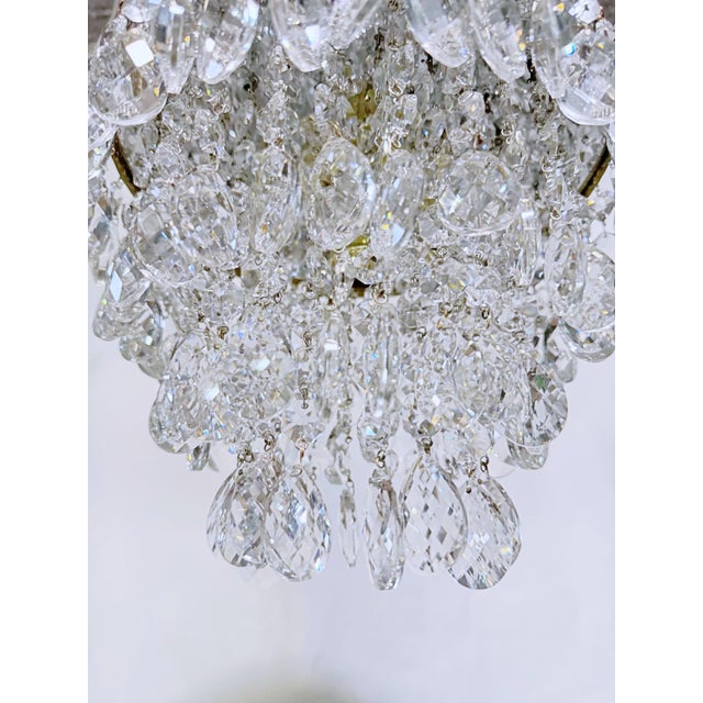 Hollywood Regency Vintage Multi-Tier Crystal Waterfall Chandelier With Ornate Brass Rim For Sale - Image 3 of 9