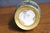 Art pottery vase featuring an elongated form with an expressive drip glaze in cobalt blue, golden yellow, cream, and...