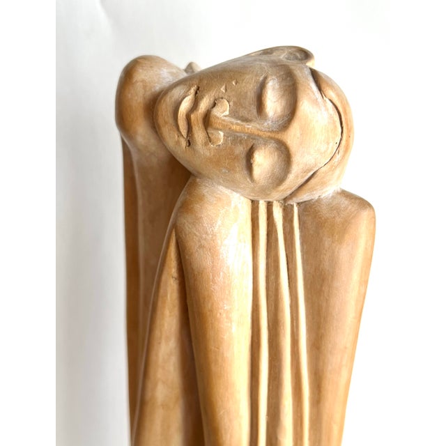 Beautiful all natural carved wood modernist figurative statue.