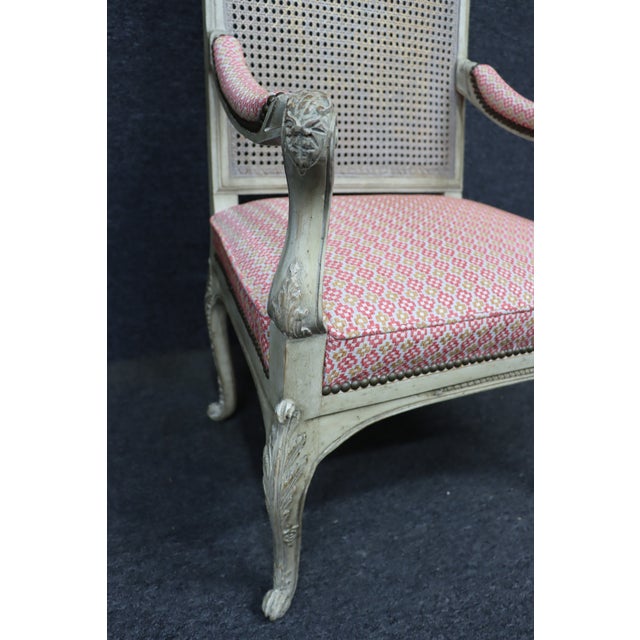 Elegant French Louis XVI revival armchair dating to the late 19th century. This refined piece features a hand-painted...