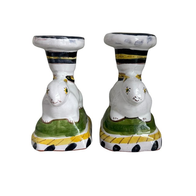 This is pair of vintage Deruta style rabbit motif candle holders. They are whimsical and delicate and are hand painted in...
