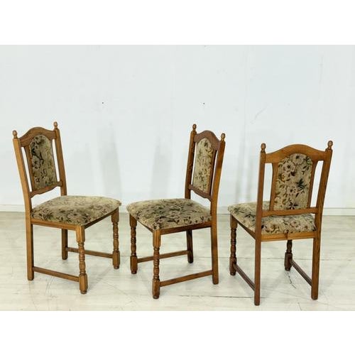 For sale is a set of three vintage dining chairs from the 1970s. The chairs impress with their classic design, sturdy...