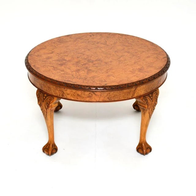 A quite large and beautifully made antique burr walnut coffee table. This was made in England, it dates from around the...