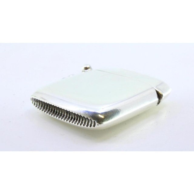 Plain Silver Matchbox with Hanging Ring, in Very Good conditions. Designed 1890 to 1919 This piece has an attribution...