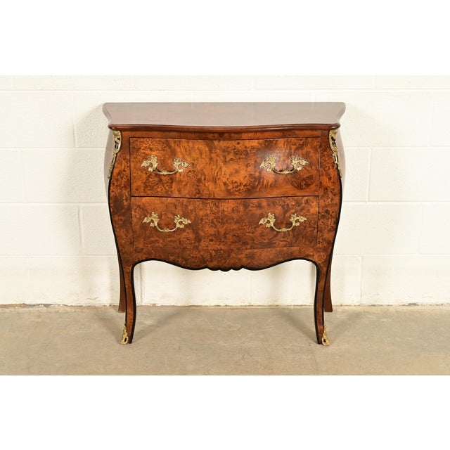 A gorgeous Italian Louis XV style Bombay form commode or chest of drawers In the manner of Paul Sormani Italy, Circa 1960s...