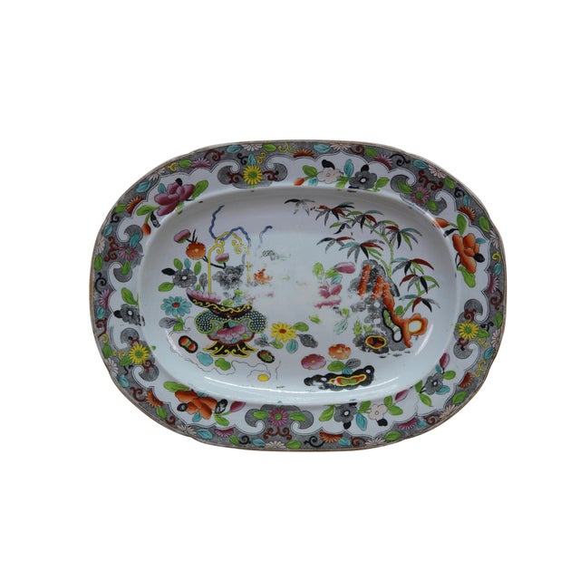 Four antique Stephen Folch serving platters / trays in the Bamboo & Basket pattern with Royal Arms mark, Circa 1825 The...