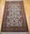 "This elegant vintage Persian Isfahan area rug, hand-knotted in the third quarter of the 20th century on a silk...