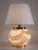 Gorgeous Italian table lamp with big Murano glass sphere base and golden metal details. Made in Murano in the 1970s. The...