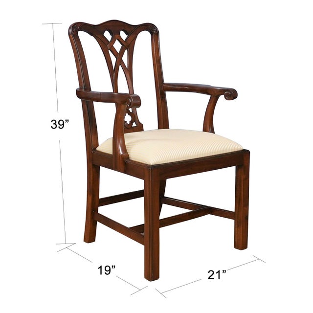 Deceptively simple in design, this set of 10 Country Chippendale Chairs from Niagara Furniture features 2 arm chairs and 8...