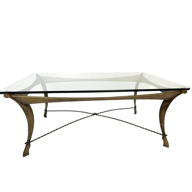 A commanding anchor for any modern or eclectic living space, this vintage mid-century cocktail table balances industrial...