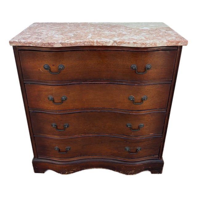 Vintage Mahogany Serpentine-Front Chest of Drawers Featuring a Pink Marble Top For Sale
