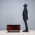 Coffee table with a closed bar compartment and open side compartments. This piece is in excellent condition, crafted from...