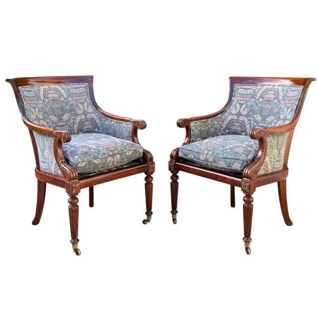 Beautiful pair of vintage Hickory Chair Regency armchairs in richly finished mahogany, featuring sculptural scroll arms,...