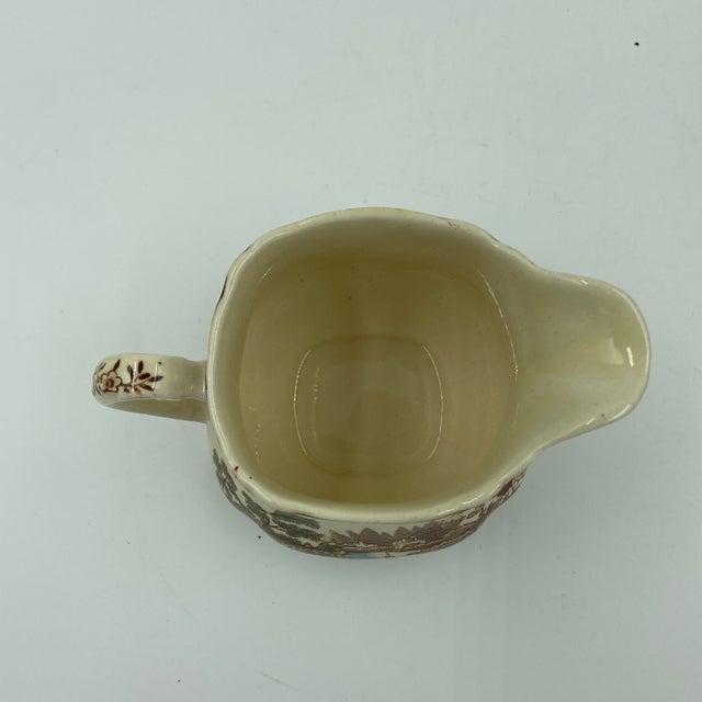 A lovely vintage English cream and sugar set in the iconic Tonquin pattern by Clarice Cliff for Royal Staffordshire....