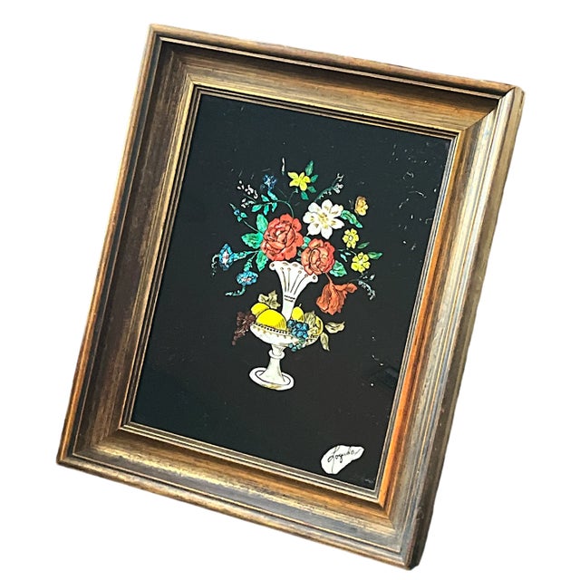 Gold framed silver foil painting of an epergne displaying fruits, including lemons and grapes as well as a variety of...