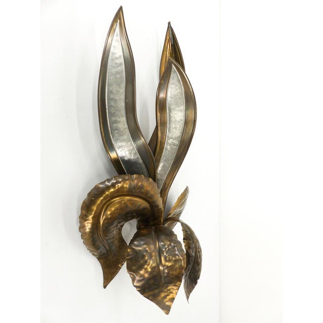 Large brutalist wall lamp in gilded brass and silver metal with a naturalistic organic subject of a stylized exotic...