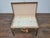 A vintage Louis Vuitton trunk from the late 1970s to early 1980s finds new life as a distinctive coffee table, seamlessly...