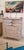 Dims.: 41"W x 19.75"D x 45"H Highboy in whitewash finish with brass accents. It consists of three bottom drawers and a...
