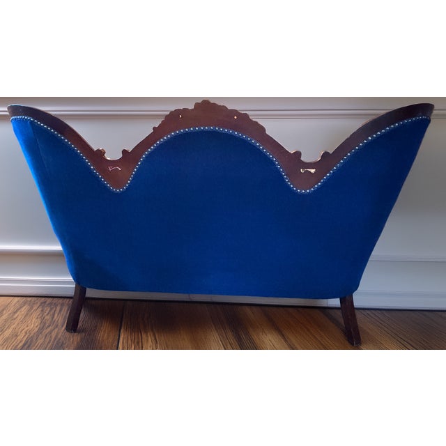 Beautiful blue vintage victorian settee with nailhead trim.