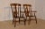 19th century pair of ladder back armchairs from the Lancashire region of England. They are made from oak and elm and are...