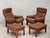 1970s, Swedish design. Armchair with footstool. Original brown furniture leather with patina, dark beech wood. Original...